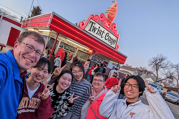 International students with their friendship family at twist cone